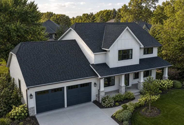 Representative home with a finished charcoal roof